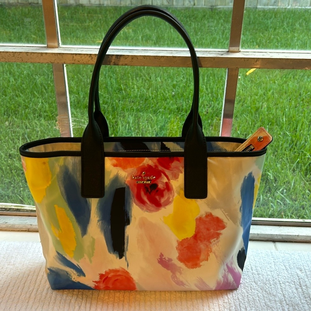 Kate Spade Story Book Classic Nylon Brynne tote with interior book lining.